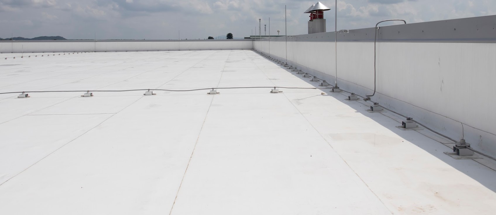 flat roof replacement cost in Vancouver, WA